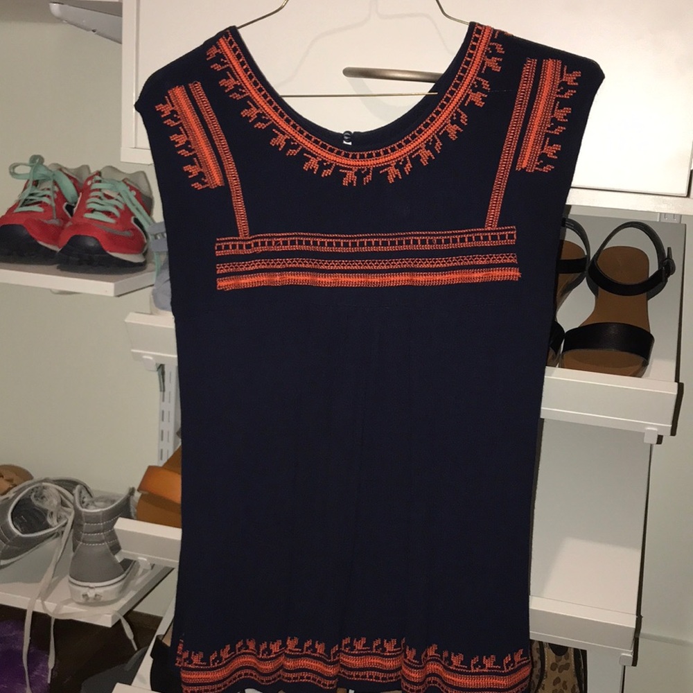 navy and orange embroidered top